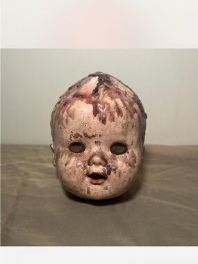 Antique creepy composition doll head